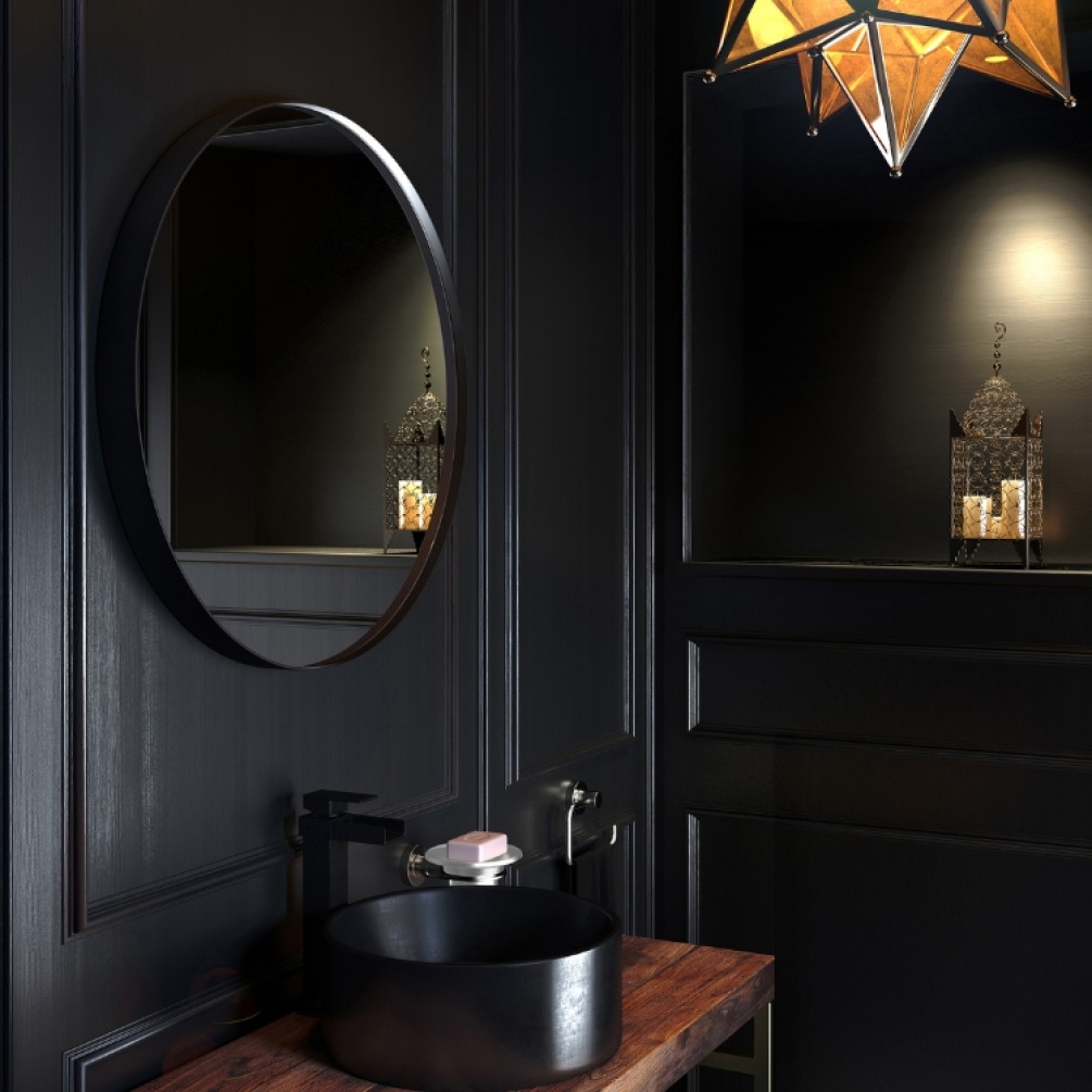Close up product lifestyle image of Origins Living City Round 600mm x 600mm Black Mirror hanging a black bathroom wall in front of a black circular basin B375622